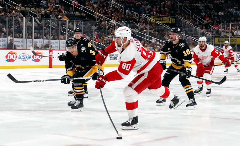 Apr 11, 2024; Pittsburgh, Pennsylvania, USA; Detroit Red Wings center Joe Veleno (90) shoots the puck against the Pittsburgh Penguins during the second period at PPG Paints Arena. Mandatory Credit: Charles LeClaire-USA TODAY Sports