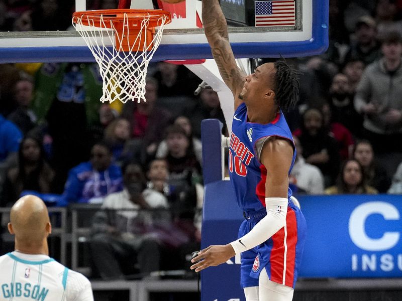 DETROIT, MICHIGAN - FEBRUARY 09: Ronald Holland II #00 of the Detroit Pistons dunks the ball against the Charlotte Hornets  at Little Caesars Arena on February 09, 2025 in Detroit, Michigan. NOTE TO USER: User expressly acknowledges and agrees that, by downloading and or using this photograph, User is consenting to the terms and conditions of the Getty Images License Agreement. (Photo by Nic Antaya/Getty Images)