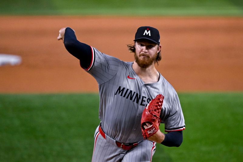 Aug 15, 2024; Arlington, Texas, USA; Minnesota Twins starting pitcher Bailey Ober (17) pitches against the Texas Rangers during the first inning at Globe Life Field. Mandatory Credit: Jerome Miron-USA TODAY Sports