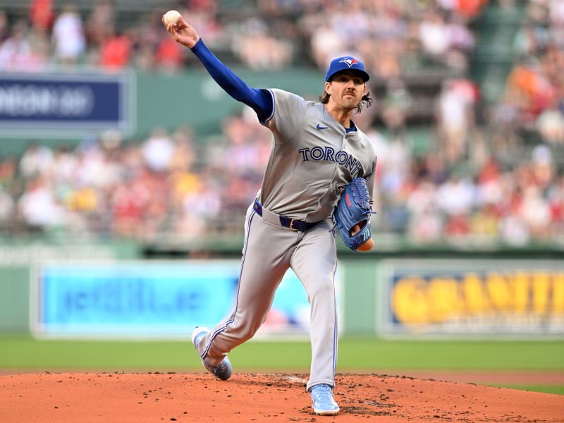 Jun 25, 2024; Boston, Massachusetts, USA; Toronto Blue Jays starting pitcher Kevin Gausman (34) pitches against the Boston Red Sox during the first inning at Fenway Park. Mandatory Credit: Brian Fluharty-USA TODAY Sports