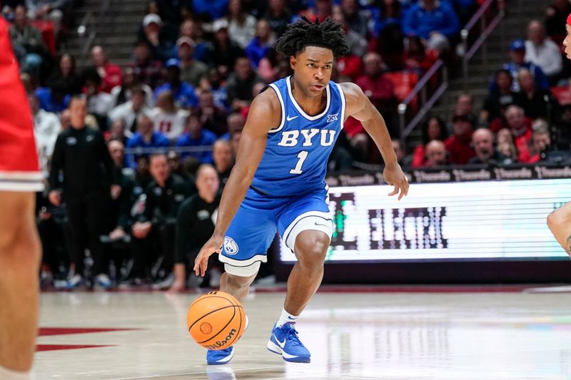 Jan 10, 2026; Salt Lake City, Utah, USA;  BYU Cougars guard Robert Wright III (1) drives during the first half against the Utah Utes at Jon M. Huntsman Center. Mandatory Credit: Aaron Baker-Imagn Images