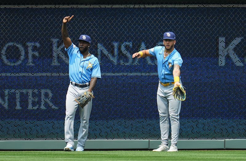 Jul 15, 2023; Kansas City, Missouri, USA; Tampa Bay Rays left fielder Randy Arozarena (56) and center fielder Jose Siri (22) appeal for fan interference on a double hit by Kansas City Royals catcher Salvador Perez (not pictured) during the fifth inning at Kauffman Stadium. Mandatory Credit: Jay Biggerstaff-USA TODAY Sports