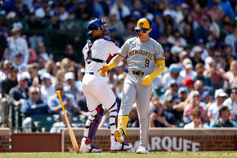 May 3, 2024; Chicago, Illinois, USA; Milwaukee Brewers first baseman Jake Bauers (9) reacts after striking out against the Chicago Cubs during the sixth inning at Wrigley Field. Mandatory Credit: Kamil Krzaczynski-USA TODAY Sports