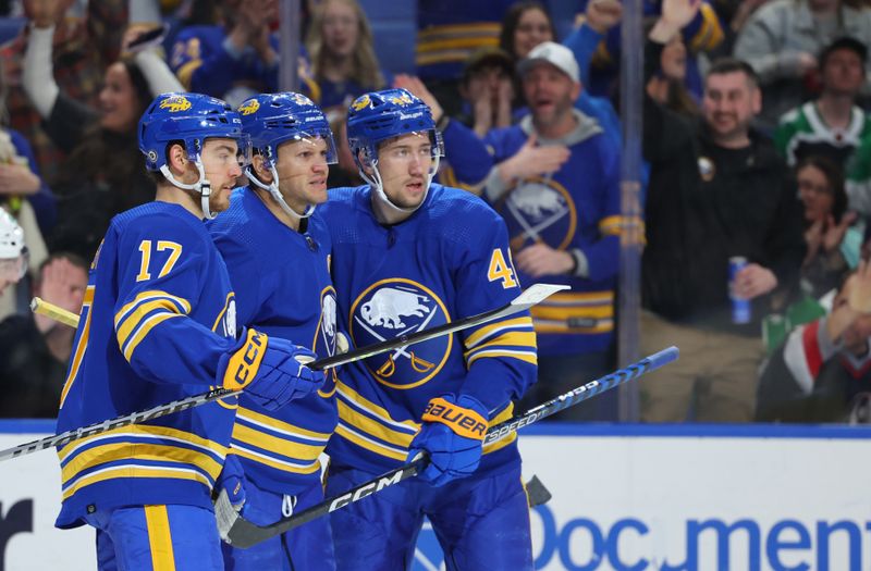 Mar 9, 2023; Buffalo, New York, USA;  Buffalo Sabres right wing Kyle Okposo (21) celebrates his goal with teammates during the second period against the Dallas Stars at KeyBank Center. Mandatory Credit: Timothy T. Ludwig-USA TODAY Sports