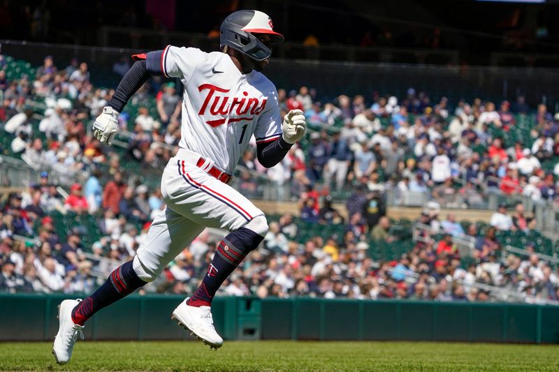 Apr 26, 2023; Minneapolis, Minnesota, USA; Minnesota Twins infielder Nick Gordon (1) heads to first on an eventual triple against the New York Yankees during the seventh inning at Target Field. Mandatory Credit: Nick Wosika-USA TODAY Sports

