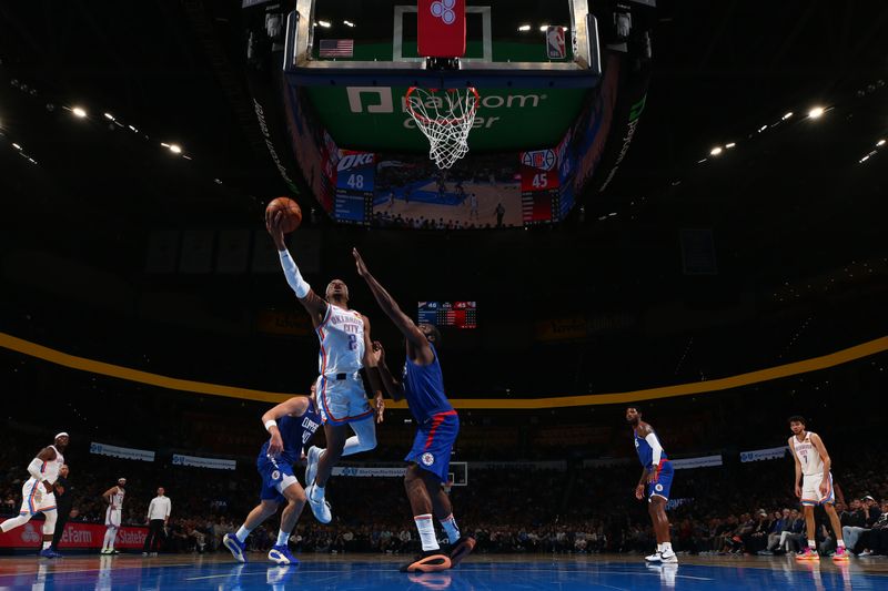 OKLAHOMA CITY, OK - FEBRUARY 22:  Shai Gilgeous-Alexander #2 of the Oklahoma City Thunder drives to the basket during the game against the LA Clippers on February 22, 2024 at Paycom Arena in Oklahoma City, Oklahoma. NOTE TO USER: User expressly acknowledges and agrees that, by downloading and or using this photograph, User is consenting to the terms and conditions of the Getty Images License Agreement. Mandatory Copyright Notice: Copyright 2024 NBAE (Photo by Zach Beeker/NBAE via Getty Images)