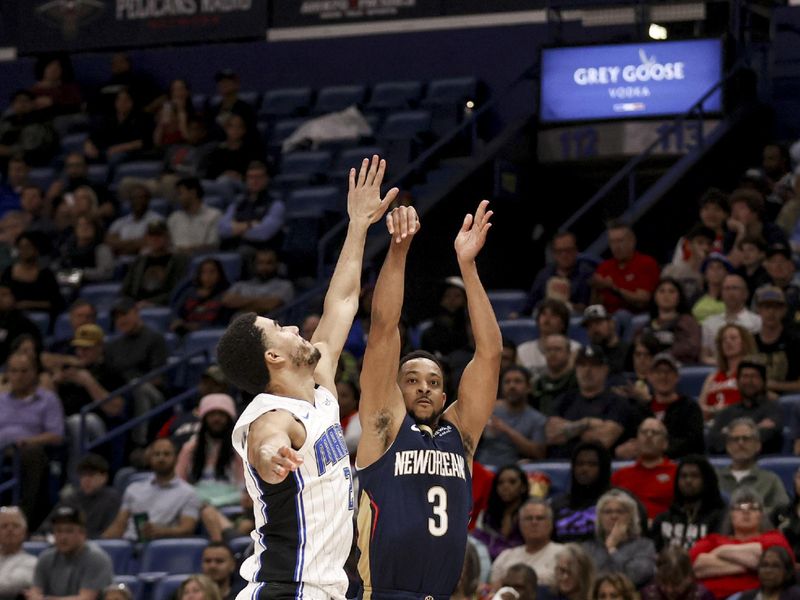 NEW ORLEANS, LOUISIANA - MARCH 13: CJ McCollum #3 of the New Orleans Pelicans shoots over Caleb Houstan #2 of the Orlando Magic during the second half of a game at the Smoothie King Center on March 13, 2025 in New Orleans, Louisiana. NOTE TO USER: User expressly acknowledges and agrees that, by downloading and or using this photograph, User is consenting to the terms and conditions of the Getty Images License Agreement. (Photo by Derick E. Hingle/Getty Images)