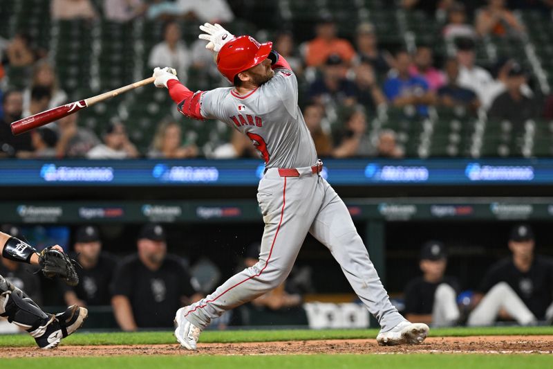 Aug 27, 2024; Detroit, Michigan, USA; Los Angeles Angels left fielder Taylor Ward (3) hits a sacrifice fly against the Detroit Tigers in the fifth inning at Comerica Park. Mandatory Credit: Lon Horwedel-USA TODAY Sports