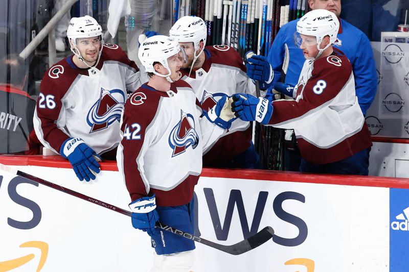 Apr 30, 2024; Winnipeg, Manitoba, CAN; Colorado Avalanche defenseman Josh Manson (42) celebrates his third period goal against the Winnipeg Jets in game five of the first round of the 2024 Stanley Cup Playoffs at Canada Life Centre. Mandatory Credit: James Carey Lauder-USA TODAY Sports