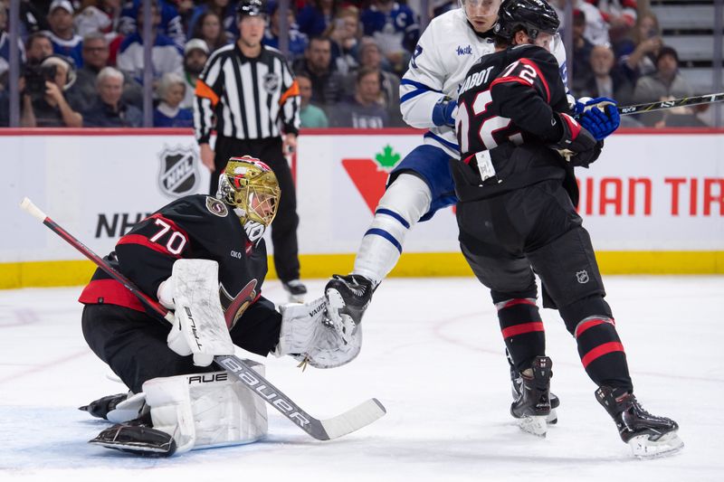 Feb 10, 2024; Ottawa, Ontario, CAN; Toronto Maple Leafs left wing Tyler Bertuzzi (59) screens Ottawa Senators goalie Joonas Korpisalo (70) in the second period at the Canadian Tire Centre. Mandatory Credit: Marc DesRosiers-USA TODAY Sports