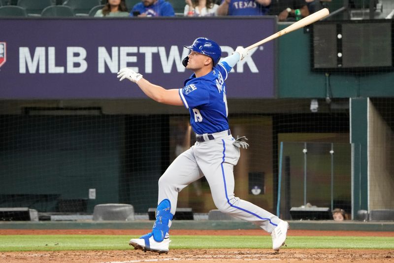 Mar 28, 2023; Arlington, Texas, USA; Kansas City Royals second baseman Michael Massey (19) follows through on his solo home run against the Texas Rangers during the sixth inning of an exhibition game at Globe Life Field. Mandatory Credit: Jim Cowsert-USA TODAY Sports