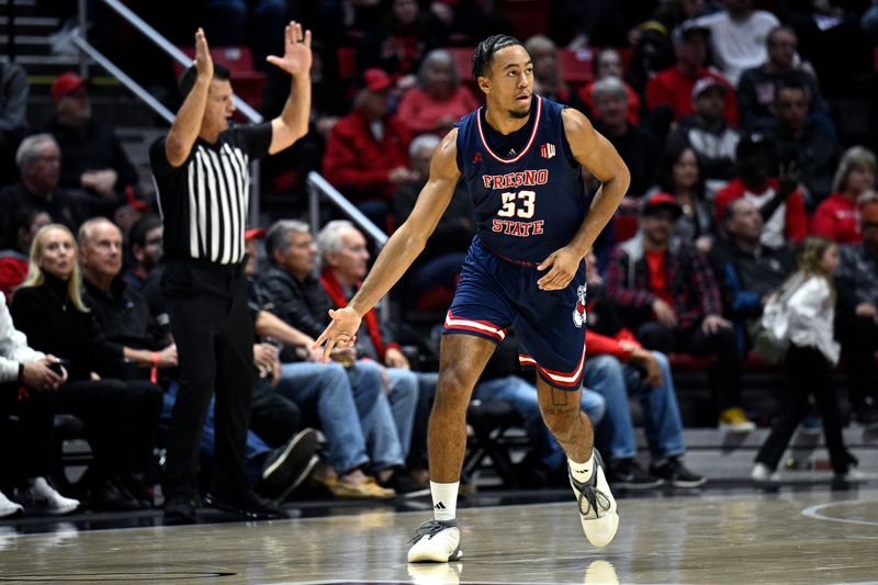 Jan 3, 2024; San Diego, California, USA; Fresno State Bulldogs guard Xavier DuSell (53) gestures after a three-point basket against the San Diego State Aztecs during the first half at Viejas Arena. Mandatory Credit: Orlando Ramirez-USA TODAY Sports 