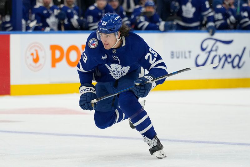 Nov 8, 2024; Toronto, Ontario, CAN; Toronto Maple Leafs forward Matthew Knies (23) skates against the Detroit Red Wings during the third period at Scotiabank Arena. Mandatory Credit: John E. Sokolowski-Imagn Images