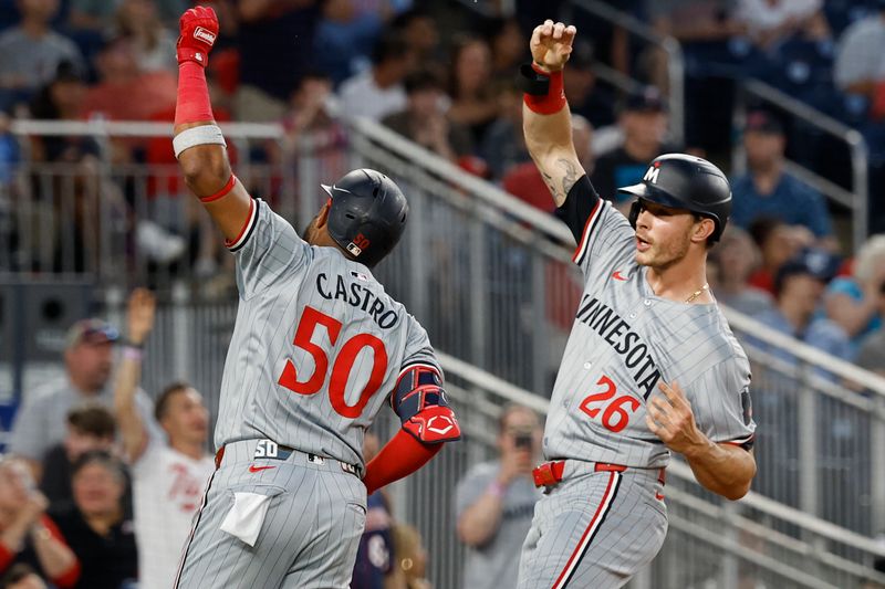 May 21, 2024; Washington, District of Columbia, USA; Minnesota Twins shortstop Willi Castro (50) celebrates with Twins outfielder Max Kepler (26) after hitting a two run home run against the Washington Nationals during the seventh inning at Nationals Park. Mandatory Credit: Geoff Burke-USA TODAY Sports