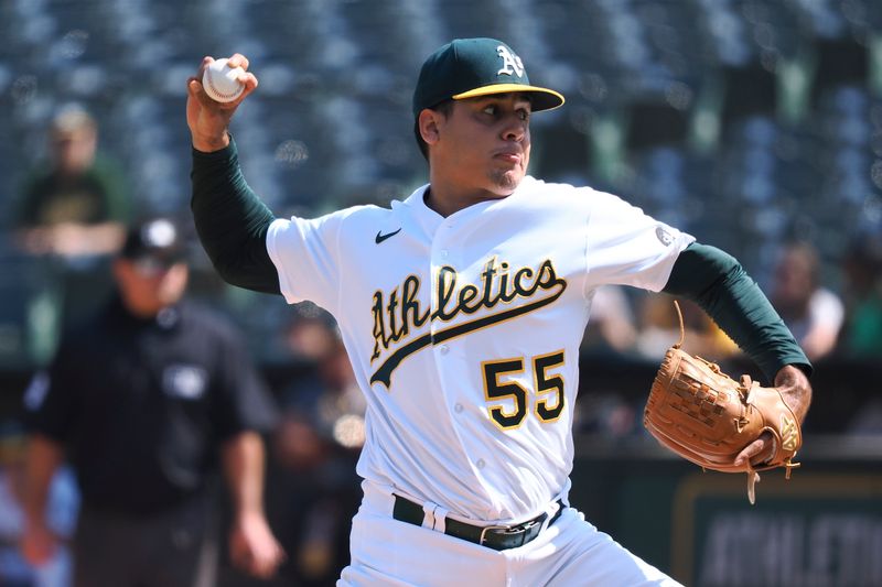 Sep 20, 2023; Oakland, California, USA; Oakland Athletics starting pitcher Adrian Martinez (55) pitches the ball against the Seattle Mariners during the fifth inning at Oakland-Alameda County Coliseum. Mandatory Credit: Kelley L Cox-USA TODAY Sports