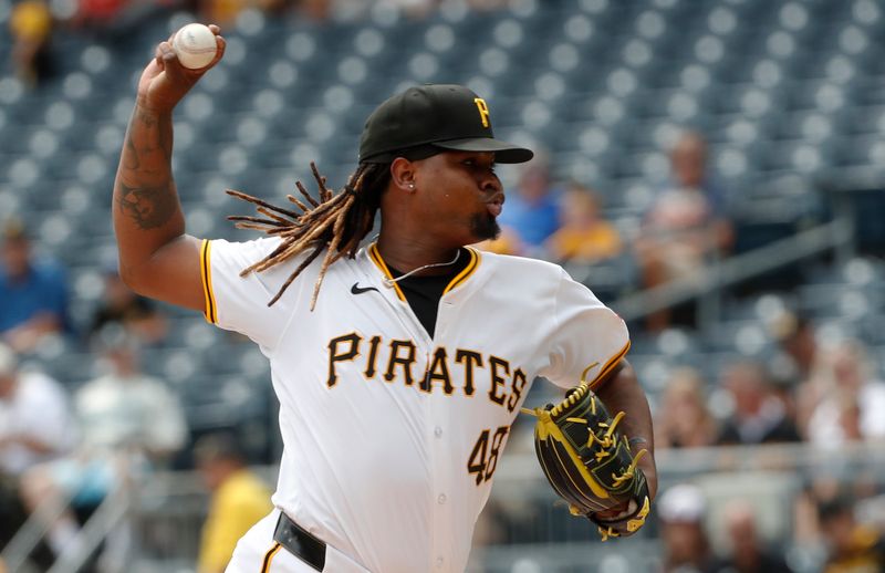 Aug 8, 2024; Pittsburgh, Pennsylvania, USA;  Pittsburgh Pirates starting pitcher Luis L. Ortiz (48) delivers against the San Diego Padres during the first inning at PNC Park. Mandatory Credit: Charles LeClaire-USA TODAY Sports