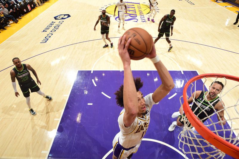 LOS ANGELES, CA - APRIL 7: Jaxson Hayes #11 of the Los Angeles Lakers drives to the basket during the game against the Minnesota Timberwolves on April 7, 2024 at Crypto.Com Arena in Los Angeles, California. NOTE TO USER: User expressly acknowledges and agrees that, by downloading and/or using this Photograph, user is consenting to the terms and conditions of the Getty Images License Agreement. Mandatory Copyright Notice: Copyright 2024 NBAE (Photo by Juan Ocampo/NBAE via Getty Images)