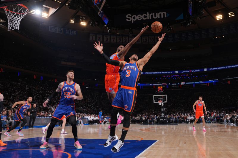 NEW YORK, NY - MARCH 31: Josh Hart #3 of the New York Knicks rebounds the ball during the game against the Oklahoma City Thunder on March 31, 2024 at Madison Square Garden in New York City, New York.  NOTE TO USER: User expressly acknowledges and agrees that, by downloading and or using this photograph, User is consenting to the terms and conditions of the Getty Images License Agreement. Mandatory Copyright Notice: Copyright 2024 NBAE  (Photo by Jesse D. Garrabrant/NBAE via Getty Images)