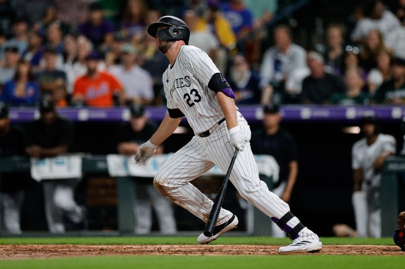 Aug 6, 2024; Denver, Colorado, USA; Colorado Rockies right fielder Kris Bryant (23) hits a double in the eighth inning against the New York Mets at Coors Field. Mandatory Credit: Isaiah J. Downing-USA TODAY Sports