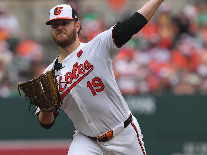 May 27, 2024; Baltimore, Maryland, USA; Baltimore Orioles pitcher Cole Irvin (19) delivers a pitch in the fifth inning against the Boston Red Sox at Oriole Park at Camden Yards. Mandatory Credit: Mitch Stringer-USA TODAY Sports