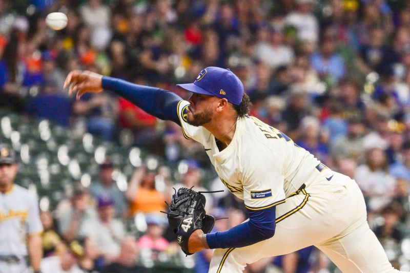 Jun 24, 2025; Milwaukee, Wisconsin, USA; Milwaukee Brewers starting pitcher Freddy Peralta (51) throws a pitch in the first inning against the Pittsburgh Pirates at American Family Field. Mandatory Credit: Benny Sieu-Imagn Images