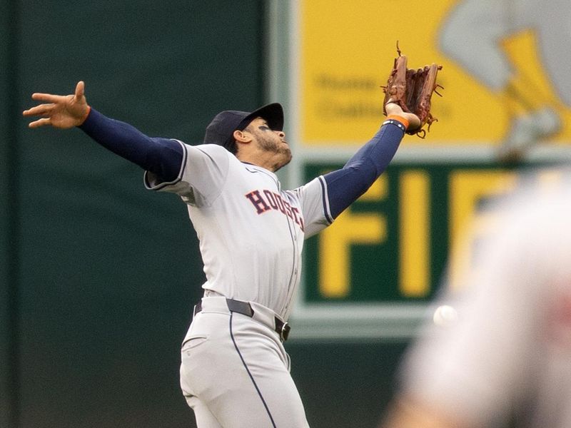 May 24, 2024; Oakland, California, USA; Houston Astros shortstop Jeremy Peña (3) drops a popup off the bat of Oakland Athletics center fielder JJ Bleday for a two-base error during the first inning at Oakland-Alameda County Coliseum. Mandatory Credit: D. Ross Cameron-USA TODAY Sports