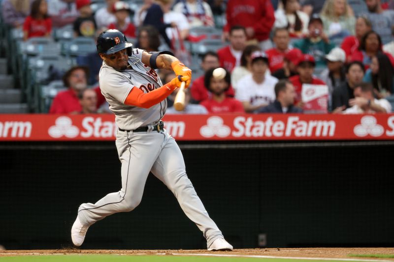 Sep 16, 2023; Anaheim, California, USA;  Detroit Tigers left fielder Andy Ibanez (77) hits a single during the first inning against the Los Angeles Angels at Angel Stadium. Mandatory Credit: Kiyoshi Mio-USA TODAY Sports