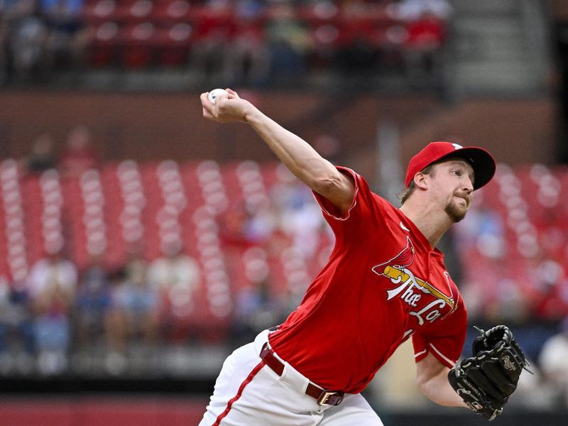 Aug 7, 2024; St. Louis, Missouri, USA;  St. Louis Cardinals starting pitcher Erick Fedde (12) pitches against the Tampa Bay Rays during the first inning at Busch Stadium. Mandatory Credit: Jeff Curry-USA TODAY Sports