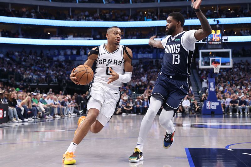 DALLAS, TX - OCTOBER 24: Keldon Johnson #0 of the San Antonio Spurs dribbles the ball during the game against the Dallas Mavericks on October 24, 2024 at American Airlines Center in Dallas, Texas. NOTE TO USER: User expressly acknowledges and agrees that, by downloading and or using this photograph, User is consenting to the terms and conditions of the Getty Images License Agreement. Mandatory Copyright Notice: Copyright 2024 NBAE (Photo by Joe Murphy/NBAE via Getty Images)