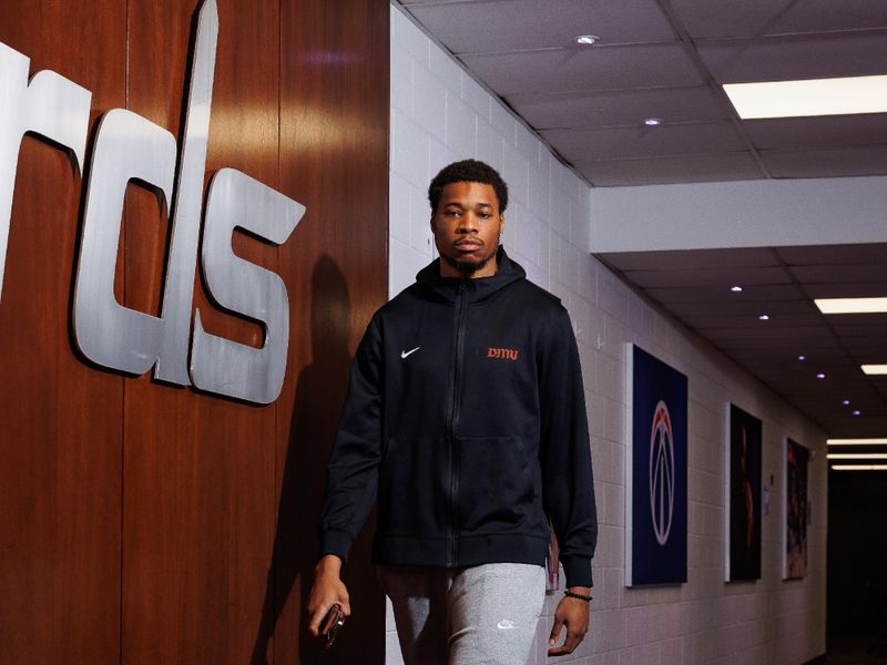 WASHINGTON, DC -? MARCH 21:  Richaun Holmes #22 of the Washington Wizards arrives to the arena before the game on March 21, 2024 at Capital One Arena in Washington, DC. NOTE TO USER: User expressly acknowledges and agrees that, by downloading and or using this Photograph, user is consenting to the terms and conditions of the Getty Images License Agreement. Mandatory Copyright Notice: Copyright 2024 NBAE (Photo by Kenny Giarla/NBAE via Getty Images)