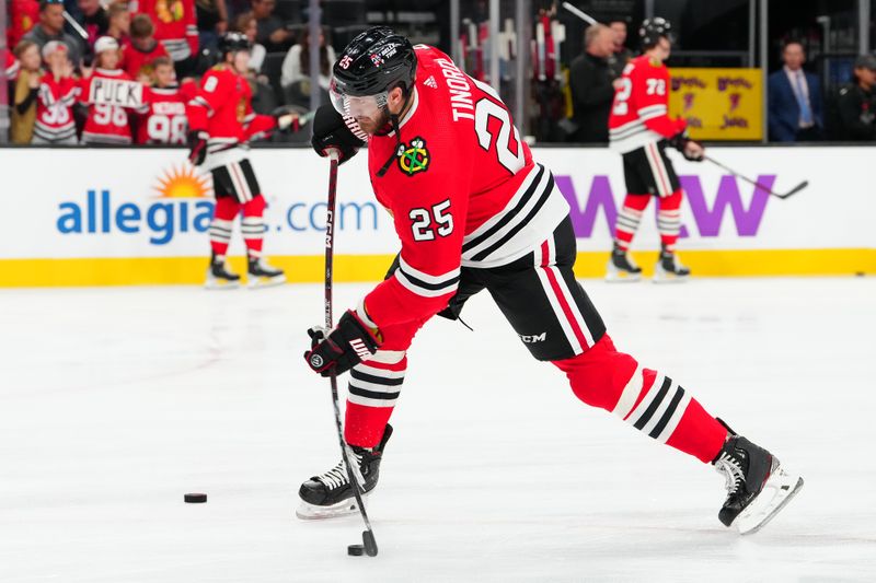 Oct 27, 2023; Las Vegas, Nevada, USA; Chicago Blackhawks defenseman Jarred Tinordi (25) warms up before a game against the Vegas Golden Knights at T-Mobile Arena. Mandatory Credit: Stephen R. Sylvanie-USA TODAY Sports