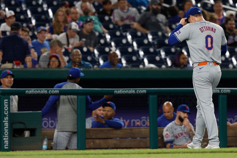 Jun 3, 2024; Washington, District of Columbia, USA; New York Mets pitcher Adam Ottavino (0) walks to the dugout after being removed from the game against the Washington Nationals during the ninth inning at Nationals Park. Mandatory Credit: Geoff Burke-USA TODAY Sports