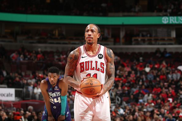 CHICAGO, IL - DECEMBER 6: DeMar DeRozan #11 of the Chicago Bulls shoots a free throw during the game against the Charlotte Hornets on December 6, 2023 at the United Center in Chicago, Illinois. NOTE TO USER: User expressly acknowledges and agrees that, by downloading and or using this Photograph, user is consenting to the terms and conditions of the Getty Images License Agreement. Mandatory Copyright Notice: Copyright 2023 NBAE (Photo by Gary Dineen/NBAE via Getty Images).