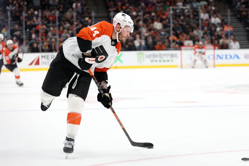 Nov 10, 2023; Anaheim, California, USA; Philadelphia Flyers left wing Nicolas Deslauriers (44) shoots the puck during the first period against the Anaheim Ducks at Honda Center. Mandatory Credit: Kiyoshi Mio-USA TODAY Sports