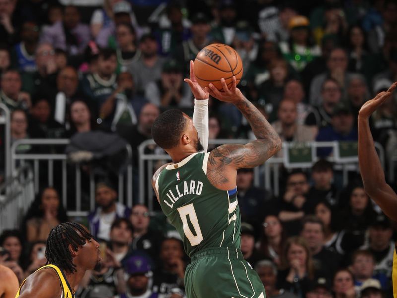 MILWAUKEE, WI - APRIL 21: Damian Lillard #0 of the Milwaukee Bucks drives to the basket during the game against the Indiana Pacers during Round 1 Game 1 of the 2024 NBA Playoffs on April 21, 2024 at the Fiserv Forum Center in Milwaukee, Wisconsin. NOTE TO USER: User expressly acknowledges and agrees that, by downloading and or using this Photograph, user is consenting to the terms and conditions of the Getty Images License Agreement. Mandatory Copyright Notice: Copyright 2024 NBAE (Photo by Gary Dineen/NBAE via Getty Images).