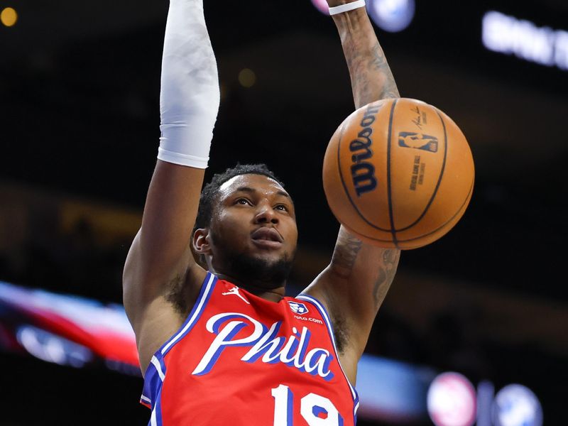 ATLANTA, GEORGIA - MARCH 23: Justin Edwards #19 of the Philadelphia 76ers dunks during the first quarter against the Atlanta Hawks at State Farm Arena on March 23, 2025 in Atlanta, Georgia. NOTE TO USER: User expressly acknowledges and agrees that, by downloading and or using this photograph, User is consenting to the terms and conditions of the Getty Images License Agreement. (Photo by Todd Kirkland/Getty Images)
