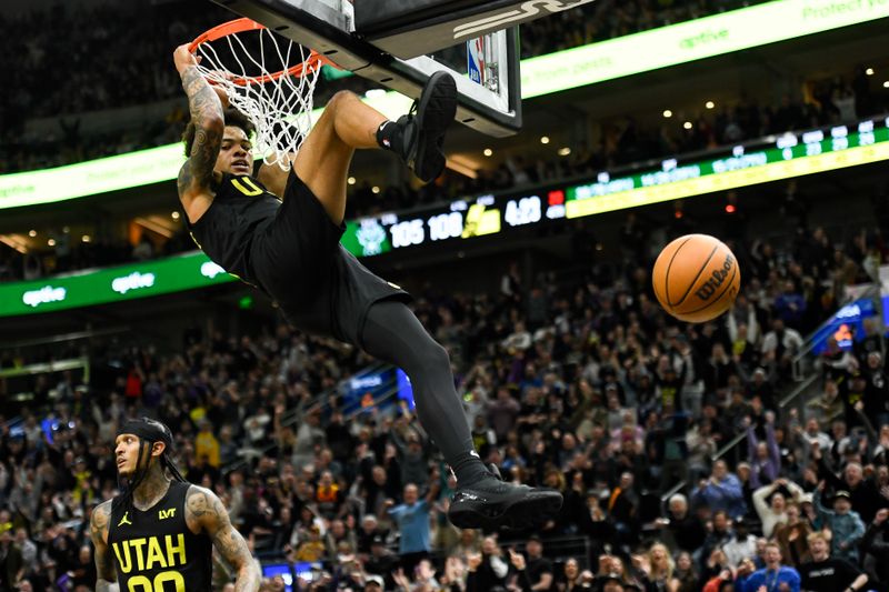 SALT LAKE CITY, UTAH - FEBRUARY 04: Keyonte George #3 of the Utah Jazz dunks during the second half of a game against the Milwaukee Bucks at Delta Center on February 04, 2024 in Salt Lake City, Utah. NOTE TO USER: User expressly acknowledges and agrees that, by downloading and or using this photograph, User is consenting to the terms and conditions of the Getty Images License Agreement. (Photo by Alex Goodlett/Getty Images)