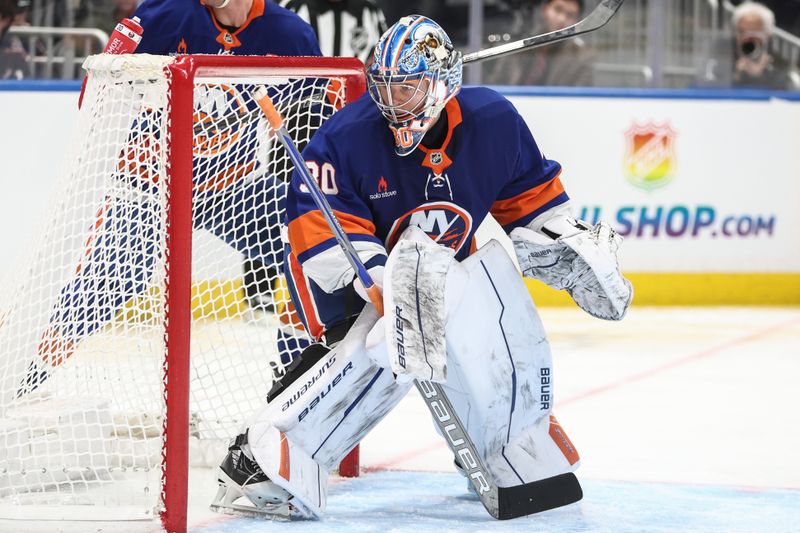 Jan 16, 2025; Elmont, New York, USA;  New York Islanders goaltender Ilya Sorokin (30) defends the net in the third period against the Philadelphia Flyers at UBS Arena. Mandatory Credit: Wendell Cruz-Imagn Images