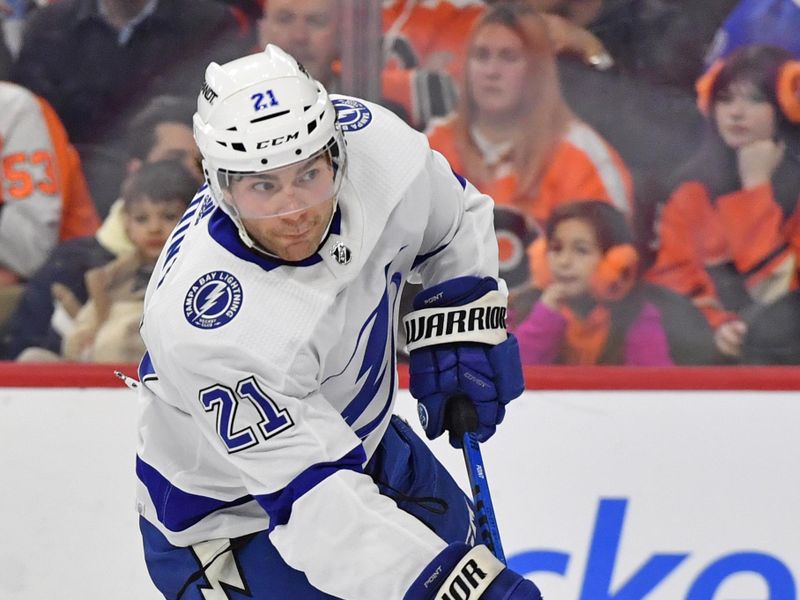 Feb 27, 2024; Philadelphia, Pennsylvania, USA; Tampa Bay Lightning center Brayden Point (21) takes a shot on goal against the Philadelphia Flyers during the second period at Wells Fargo Center. Mandatory Credit: Eric Hartline-USA TODAY Sports