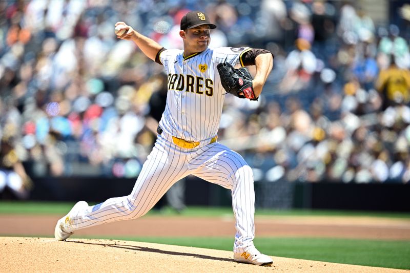 Jun 12, 2024; San Diego, California, USA; San Diego Padres starting pitcher Michael King (34) pitches against the Oakland Athletics during the first inning at Petco Park. Mandatory Credit: Orlando Ramirez-USA TODAY Sports