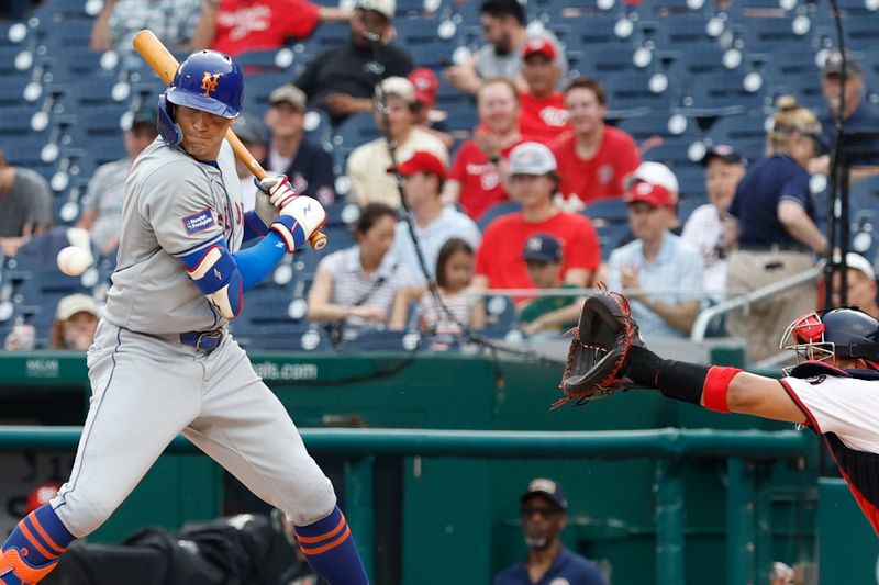 Jun 5, 2024; Washington, District of Columbia, USA; New York Mets outfielder Brandon Nimmo (9) is hit by a pitch against the Washington Nationals during the seventh inning at Nationals Park. Mandatory Credit: Geoff Burke-USA TODAY Sports