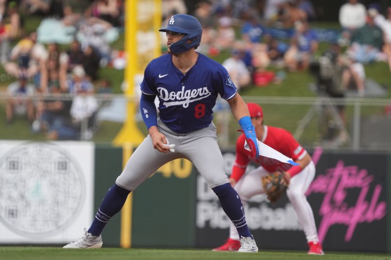 Mar 5, 2025; Tempe, Arizona, USA; Los Angeles Dodgers third base Enrique Hernandez (8) leads off second base against the Los Angeles Angels in the second inning at Tempe Diablo Stadium. Mandatory Credit: Rick Scuteri-Imagn Images