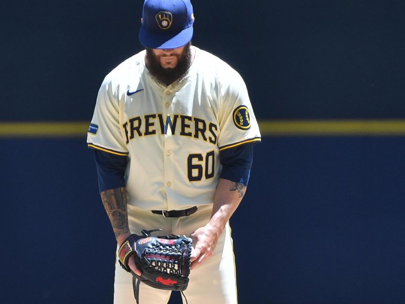 Jun 26, 2024; Milwaukee, Wisconsin, USA; Milwaukee Brewers starting pitcher Dallas Keuchel (60) prepares to deliver a pitch against the Texas Rangers in the first inning at American Family Field. Mandatory Credit: Michael McLoone-USA TODAY Sports