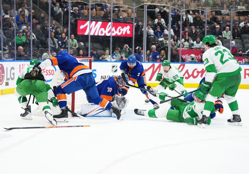 Mar 17, 2026; Toronto, Ontario, CAN; Toronto Maple Leafs left wing Matthew Knies (23) looks for the puck in front of New York Islanders goaltender Ilya Sorokin (30) during the third period at Scotiabank Arena. Mandatory Credit: Nick Turchiaro-Imagn Images