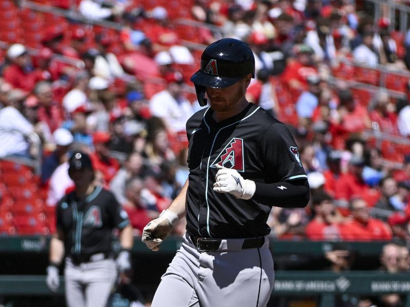 Apr 24, 2024; St. Louis, Missouri, USA;  Arizona Diamondbacks right fielder Pavin Smith (26) scores against the St. Louis Cardinals during the first inning at Busch Stadium. Mandatory Credit: Jeff Curry-USA TODAY Sports