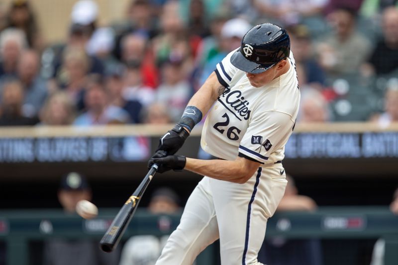 May 10, 2023; Minneapolis, Minnesota, USA; Minnesota Twins right fielder Max Kepler (26) hits a solo home run in the first inning against the San Diego Padres at Target Field. Mandatory Credit: Jesse Johnson-USA TODAY Sports