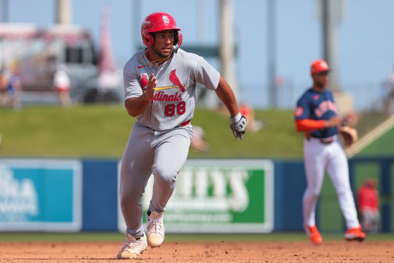Feb 22, 2026; West Palm Beach, Florida, USA; St. Louis Cardinals designated hitter Raniel Rodriguez (88) runs toward third base against the Houston Astros during the third inning at CACTI Park of the Palm Beaches. Mandatory Credit: Sam Navarro-Imagn Images
