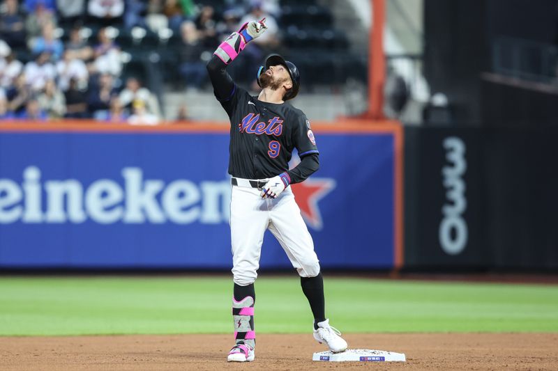 May 13, 2025; New York City, New York, USA; New York Mets left fielder Brandon Nimmo (9) gestures after hitting a RBI double in the first inning against the Pittsburgh Pirates at Citi Field. Mandatory Credit: Wendell Cruz-Imagn Images