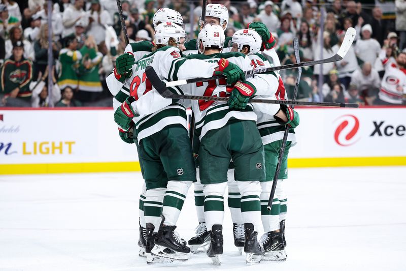 Nov 30, 2024; Saint Paul, Minnesota, USA; Minnesota Wild left wing Kirill Kaprizov (97) celebrates his goal with teammates during the second period against the Nashville Predators at Xcel Energy Center. Mandatory Credit: Matt Krohn-Imagn Images