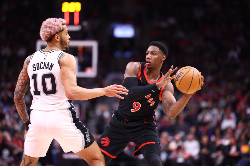 TORONTO, CANADA - MARCH 23:  RJ Barrett #9 of the Toronto Raptors passes the ball during the game against the San Antonio Spurs on March 23, 2025 at the Scotiabank Arena in Toronto, Ontario, Canada.  NOTE TO USER: User expressly acknowledges and agrees that, by downloading and or using this Photograph, user is consenting to the terms and conditions of the Getty Images License Agreement.  Mandatory Copyright Notice: Copyright 2025 NBAE (Photo by Vaughn Ridley/NBAE via Getty Images)